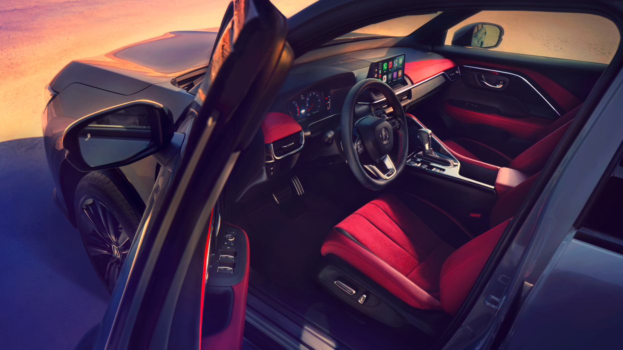 Gros plan d’un Acura ADX vu de côté, montrant l’habitacle.