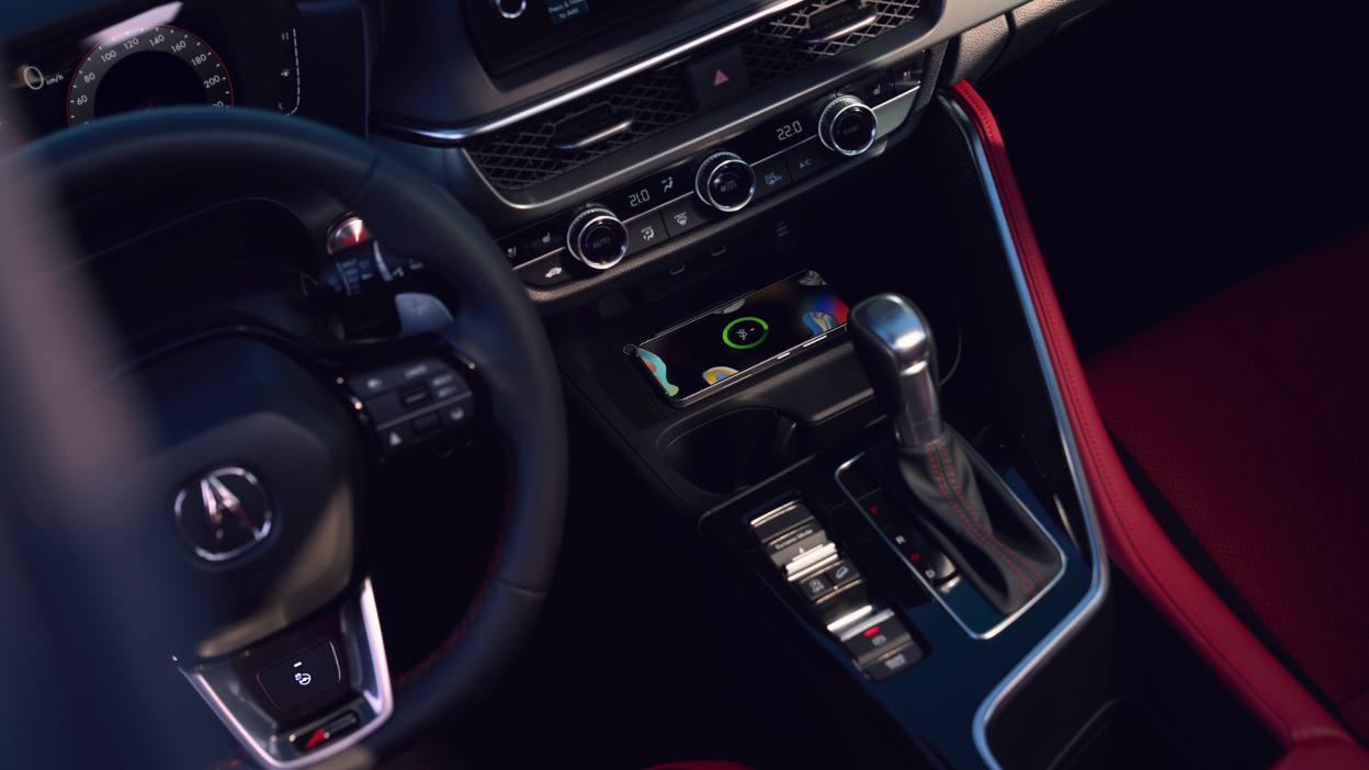 Close-up image of steering whel and dashboard. 