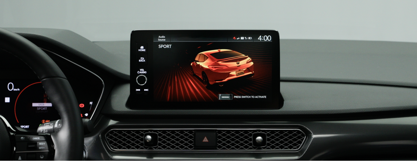 Closeup view of interior touchscreen showcasing IDS in Sport Mode on screen.
