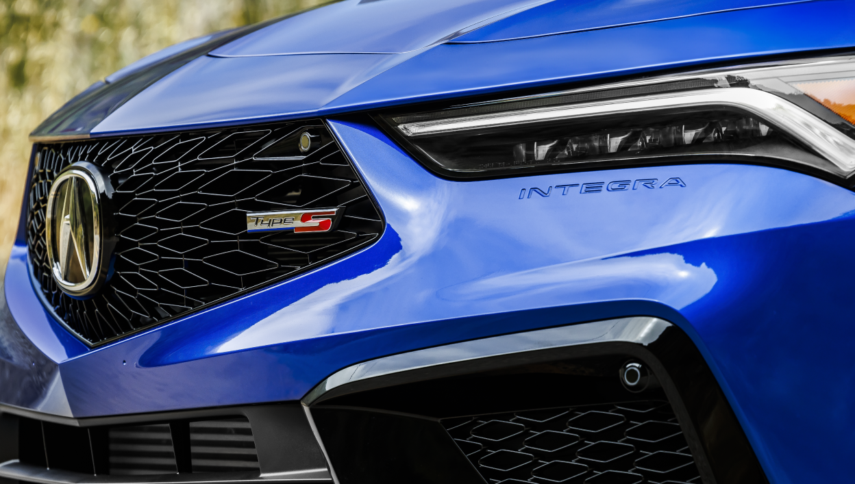 Close-up of grill on a blue Integra.