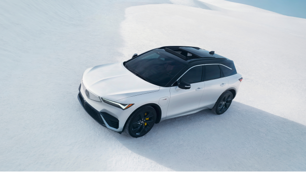 3/4 bird’s eye front view of a white ZDX parked on a salt flat.